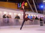 Figure skater Callum Leach on outdoor ice rink.