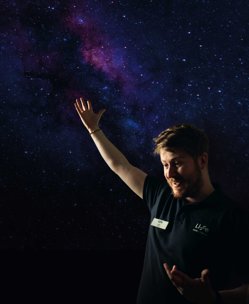 Jake delivering a workshop in Life Science Centre's mobile Planetarium.