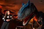 Woman looking at a huge dinosaur replica at Newcastle's Life Science Centre