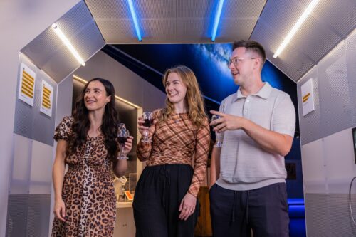 Adults enjoying a wine in Life Science Centre's Space Zone.