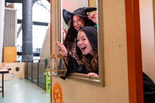 Two women in Halloween costumes at Newcastle's Life Science Centre.